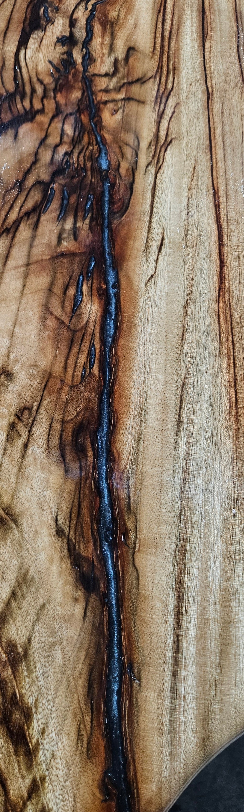 Close-up of a wooden surface with visible grain and texture